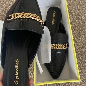 Black and gold flats